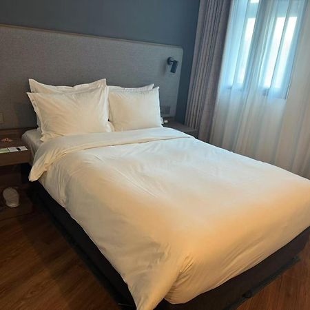 Holiday Inn Express Qingdao City Center By Ihg Buitenkant foto